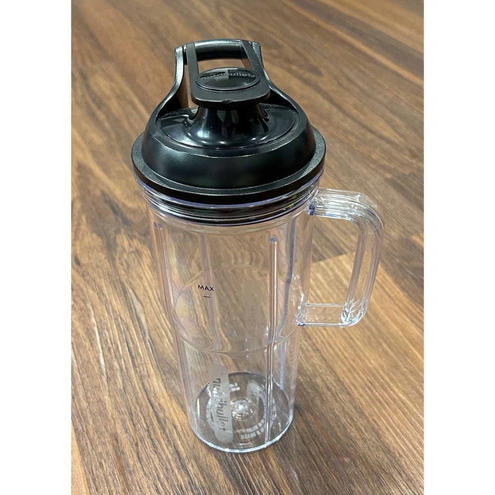 NutriBullet 24 oz Travel Cup with a‎ handled design and black to-go lid New